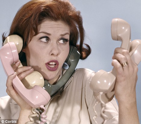 multitasking secretary with phones