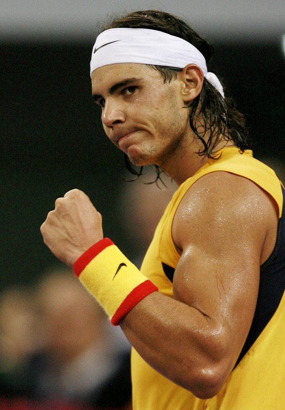 Spain's Rafael Nadal celebrates a point won against Russia's Nikolay Davydenko, 17 November 2006, at the Tennis Masters Cup in Shanghai. Nadal defeated Davydenko 5-7, 6-4, 6-4 to qualify for the semi-finals. AFP PHOTO/Frederic J. BROWN (Photo credit should read FREDERIC J. BROWN/AFP/Getty Images)